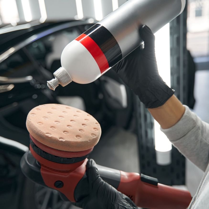 professional-detailer-preparing-electric-buffer-fo-2025-03-08-19-36-41-utc-min Professional Detailer Preparing Electric Buffer